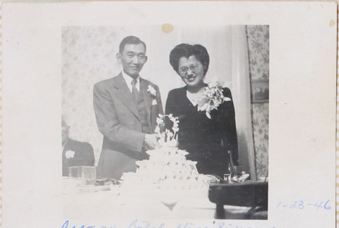 Couple with wedding cake (ddr-densho-464-87)