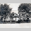 Haruo and Takako Hashiguchi with their students of the Toko Juku Japanese School (ddr-densho-474-187)
