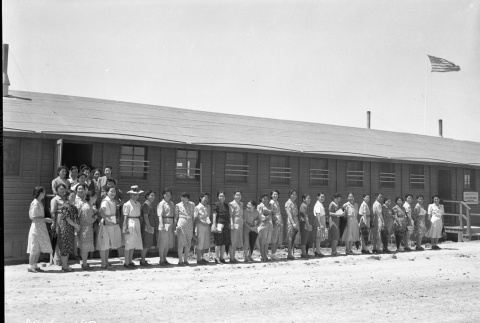 Volunteers lined up in front of the Minidoka Elementary School (ddr-fom-1-710)