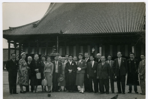 Mitsuye Yabe and Tour Group Posing in Front of Building (ddr-ohs-1-129)