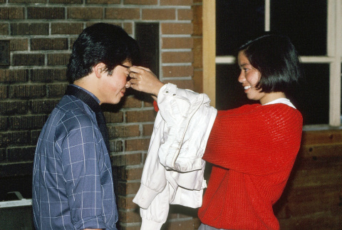 Ted Yoshida and Eunice Ueda participating in skit night (ddr-densho-336-1672)