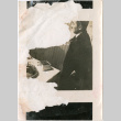 Man standing by table (ddr-densho-426-1433)