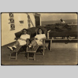 Two women sitting on lounge chairs on deck of ship (ddr-densho-426-1797)