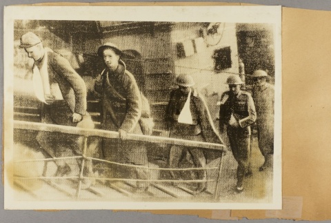 Soldiers walking up a gangplank (ddr-njpa-13-1516)