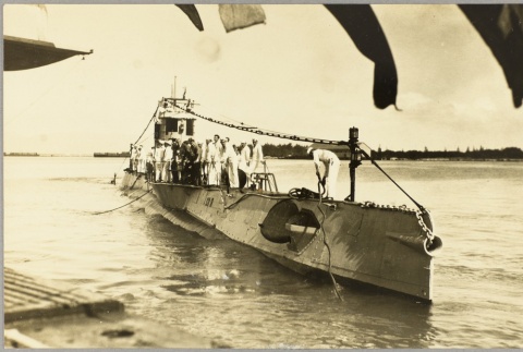 A submarine pulling up to a dock (ddr-njpa-13-155)