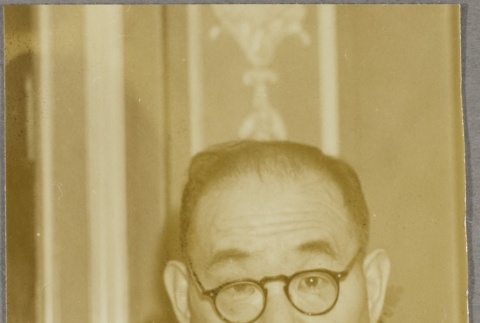 Isaku Fujimoto wearing leis (ddr-njpa-5-552)