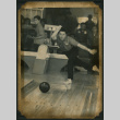 Walter Matsuoka throws a bowling ball (ddr-densho-390-103)