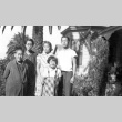 Family outside a house (ddr-densho-92-14)