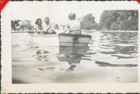 Group on a row boat (ddr-densho-321-1114)