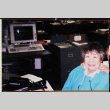 Woman in blue seated in office (ddr-densho-426-1281)