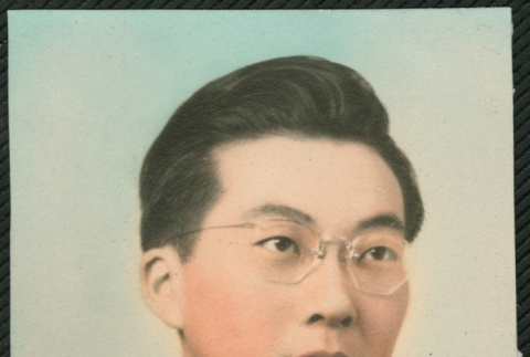 Colorized portrait of man in suit (ddr-densho-522-653)
