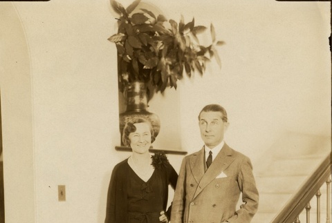 Woman and man posing on a staircase (ddr-njpa-1-40)
