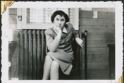 Woman sitting in office (ddr-densho-434-253)