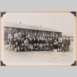 Large group photo outside barracks (ddr-densho-483-453)