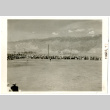 Photograph of baseball game at Manzanar (view from outfield bleachers) (ddr-csujad-47-46)