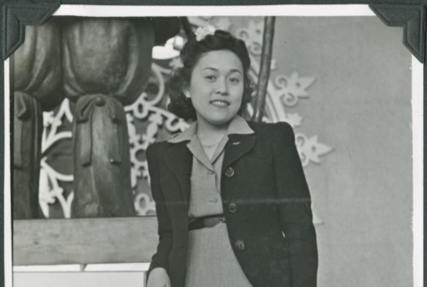 A woman in front of the Japan Pavilion at the Golden Gate International Exposition (ddr-densho-300-224)