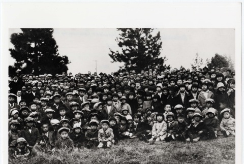 Crowd of children on the Hood River Japanese Community Hall there to celebrate the enthronement of Emperor Hirohito (ddr-densho-259-662)
