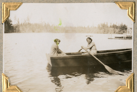 Two women in rowboat (ddr-densho-383-307)