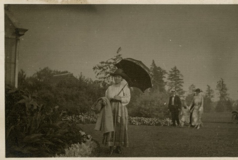 Issei woman at a park (ddr-densho-182-151)