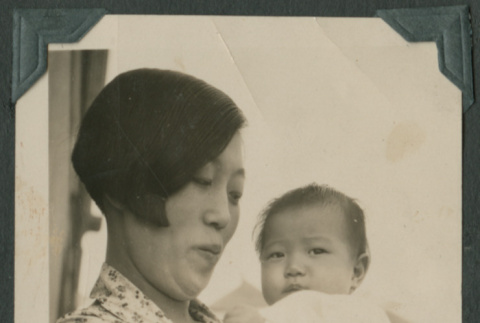 Iku Takahashi holding baby (ddr-densho-355-340)