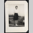 Woman on a wooden footpath (ddr-densho-542-736)