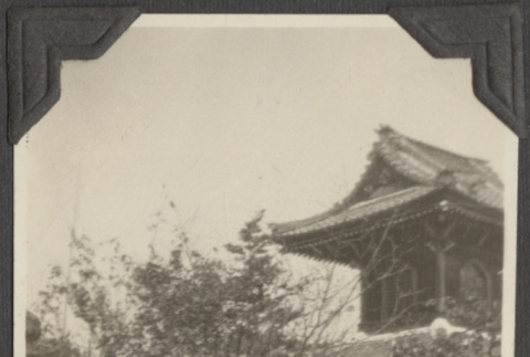 A women standing in front of a building (ddr-densho-432-178)