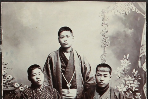 Three young Japanese men in traditional clothing (ddr-densho-259-56)