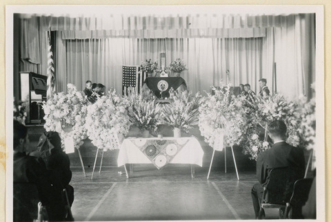 Flowers at Pvt. Minoru Geto's memorial (ddr-densho-37-2015)