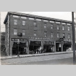 Two views of building with The Rainier Dye Works, American Furniture Company and Jackson Hotel (ddr-densho-474-185)