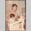 David Sakura and toddler with blocks (ddr-densho-523-487)