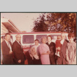Group standing next to van (ddr-densho-523-446)