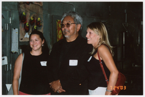 Roger Shimomura and two women at the Shimomura launch party (ddr-densho-506-15)