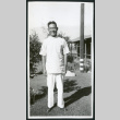 Photograph of smiling male hospital staff posing in front of the Manzanar hospital (ddr-csujad-47-198)