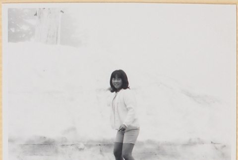 Girl by snow bank (ddr-densho-522-117)