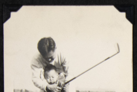 Kunikazu learns to golf (ddr-densho-542-765)