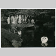 Mitsuye Yabe and Tour Group Posing by Pond (ddr-ohs-1-132)