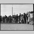 Japanese Americans waiting in mess hall line (ddr-densho-151-348)