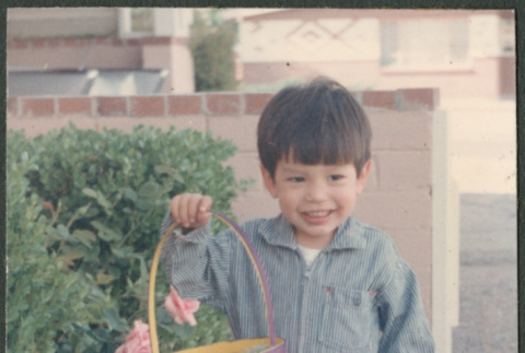 Boy with Easter basket (ddr-densho-523-426)