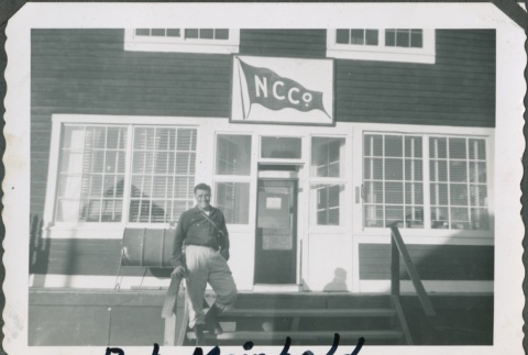 Man on the steps of the Northern Commercial Co. building (ddr-densho-321-361)