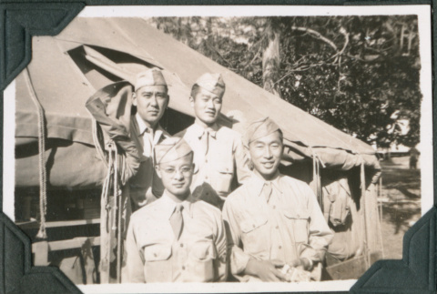 Four men outside tents. Joe Iwataki on right. (ddr-ajah-2-579)