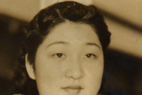 Young woman wearing leis (ddr-njpa-4-1657)