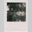Four people in a garden (ddr-densho-329-804)