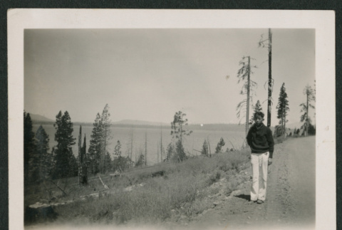Boy next to lake (ddr-densho-378-411)