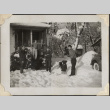 Four men and child outside of house in snow (ddr-densho-466-878)