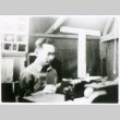 Man at desk (ddr-densho-1007-847)