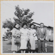 Three women and a man outside house (ddr-densho-522-55)