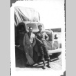 Nisei men in front of a truck (ddr-densho-157-40)