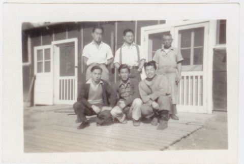 Six men outside barrack (ddr-densho-471-6)