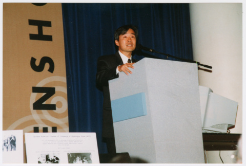 Tom Ikeda speaking at Densho Opening Gala 2 (ddr-densho-506-53)