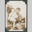 Gentaro Takahashi holding child (ddr-densho-355-313)